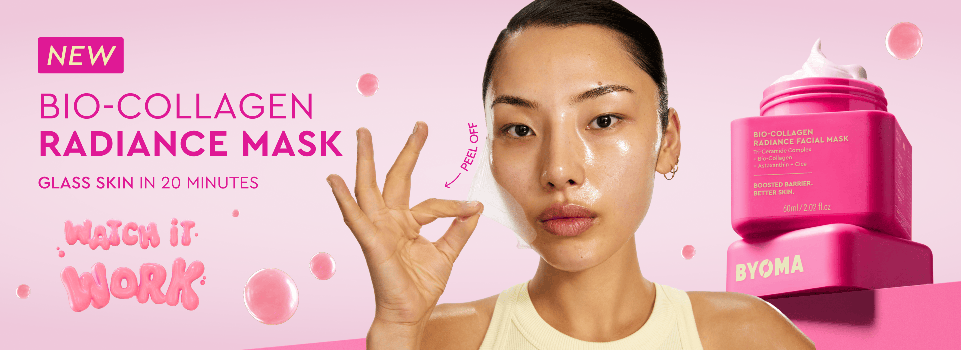Woman with glowing skin holding a mask, BYOMA product on pink background